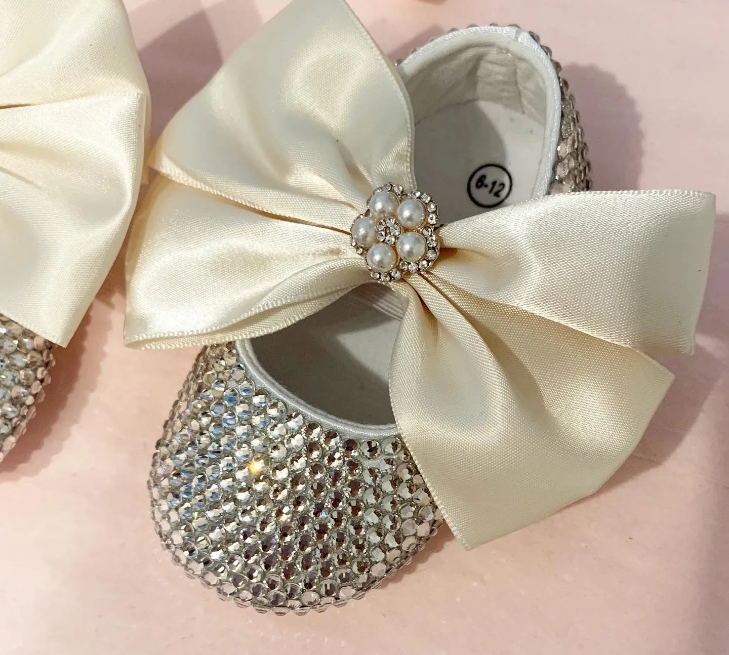 SWAROVSKI SHOES-ivory bow